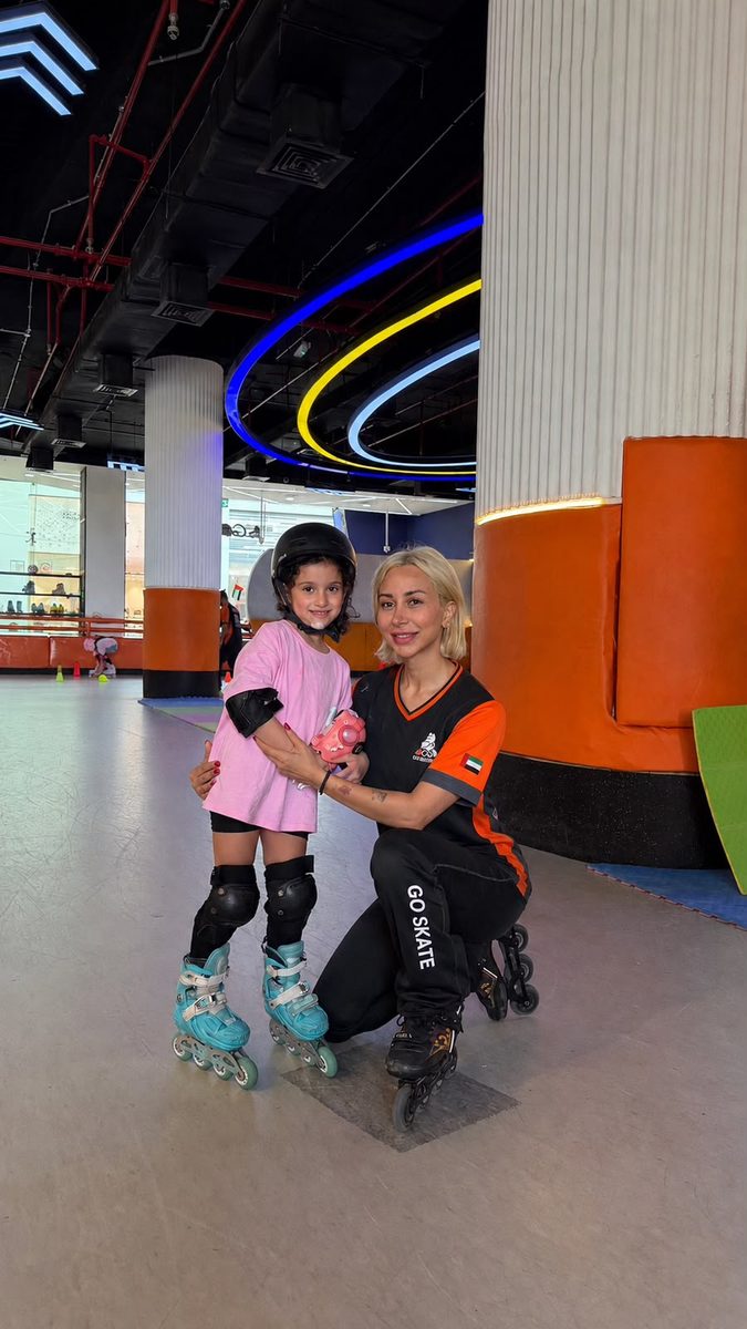 Young child learning to skate with a GoSkate coach